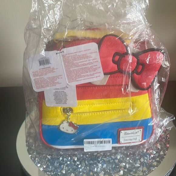 Loungefly Hello Kitty 45th Anniversary Stripes Convertible Mini Backpack kid new - Picture 2 of 16